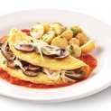 Omelette de champiñones